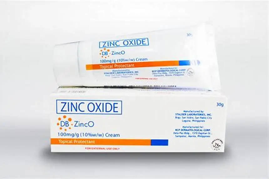 zinc oxide cream tube beside newborn hospital bag items