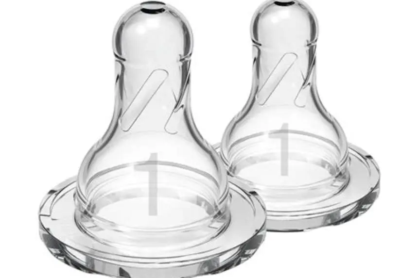 Breastfed newborn feeding with Tommee Tippee bottle and slow flow nipple