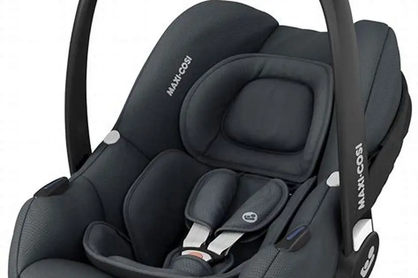 newborn positioned properly in a Maxi Cosi car seat