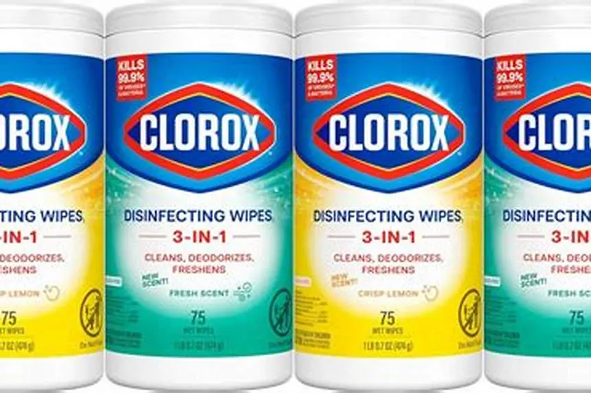 baby wipes and disinfecting wipes packages on a nursery table