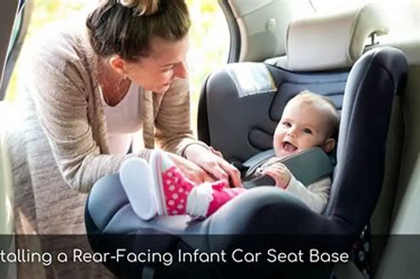 rear facing car seat base installed in car with infant insert