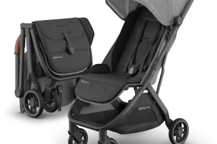 Folded stroller fitting into Kia small SUV trunk