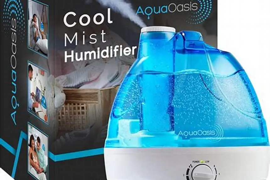 Cool mist humidifier running beside crib in small nursery
